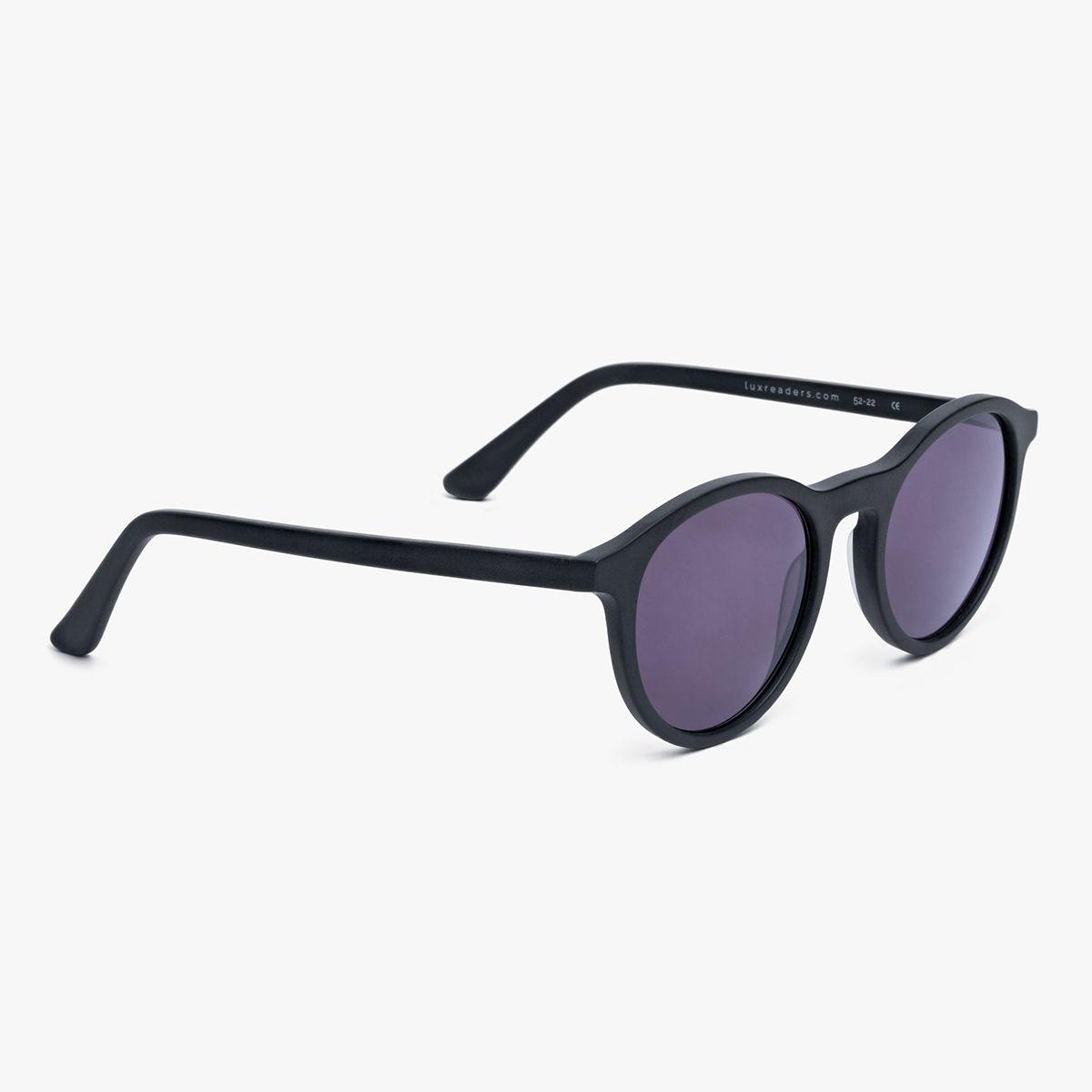 Løkken Black round sunglasses with black frame and dark lenses