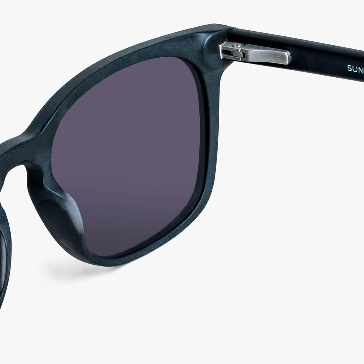 Close-up of Men's Bornholm Black sunglasses with dark rectangular frames