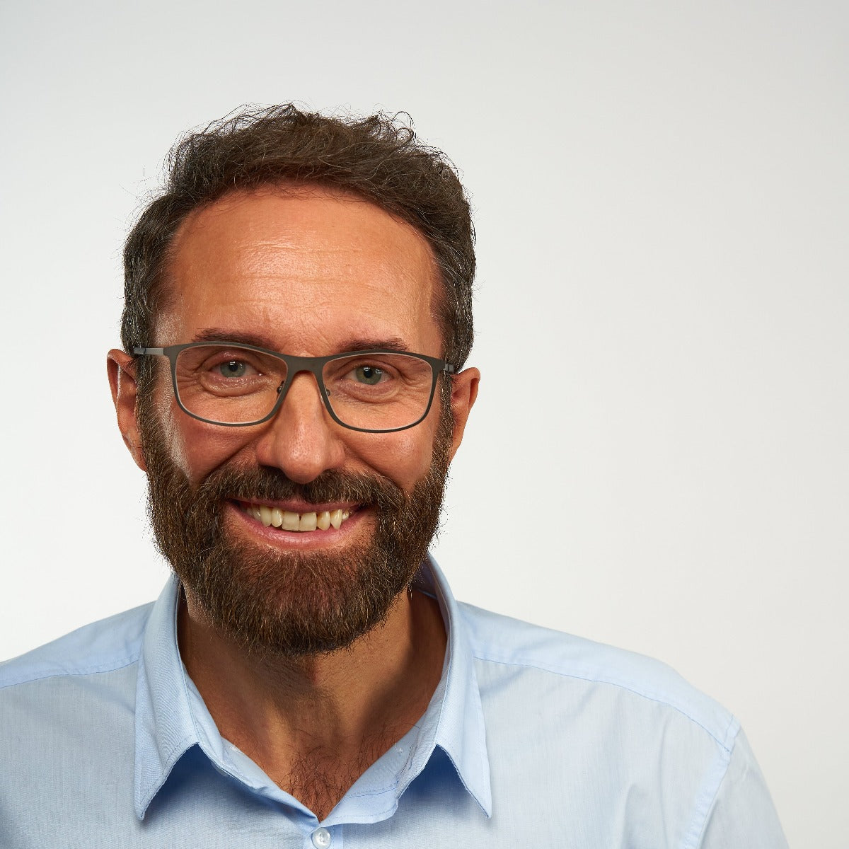 Person wearing Skagen Black glasses with a grey frame