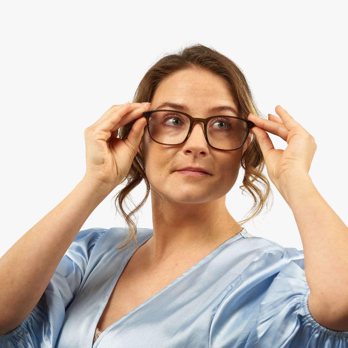 Person wearing Ebeltoft Shiny Olive glasses
