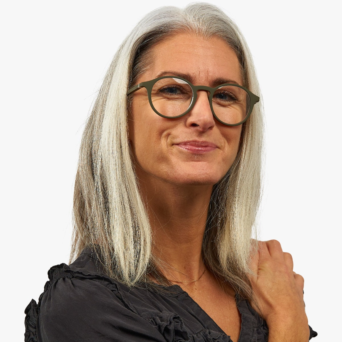 Person wearing Women's Læsø Dark Army glasses with round frames