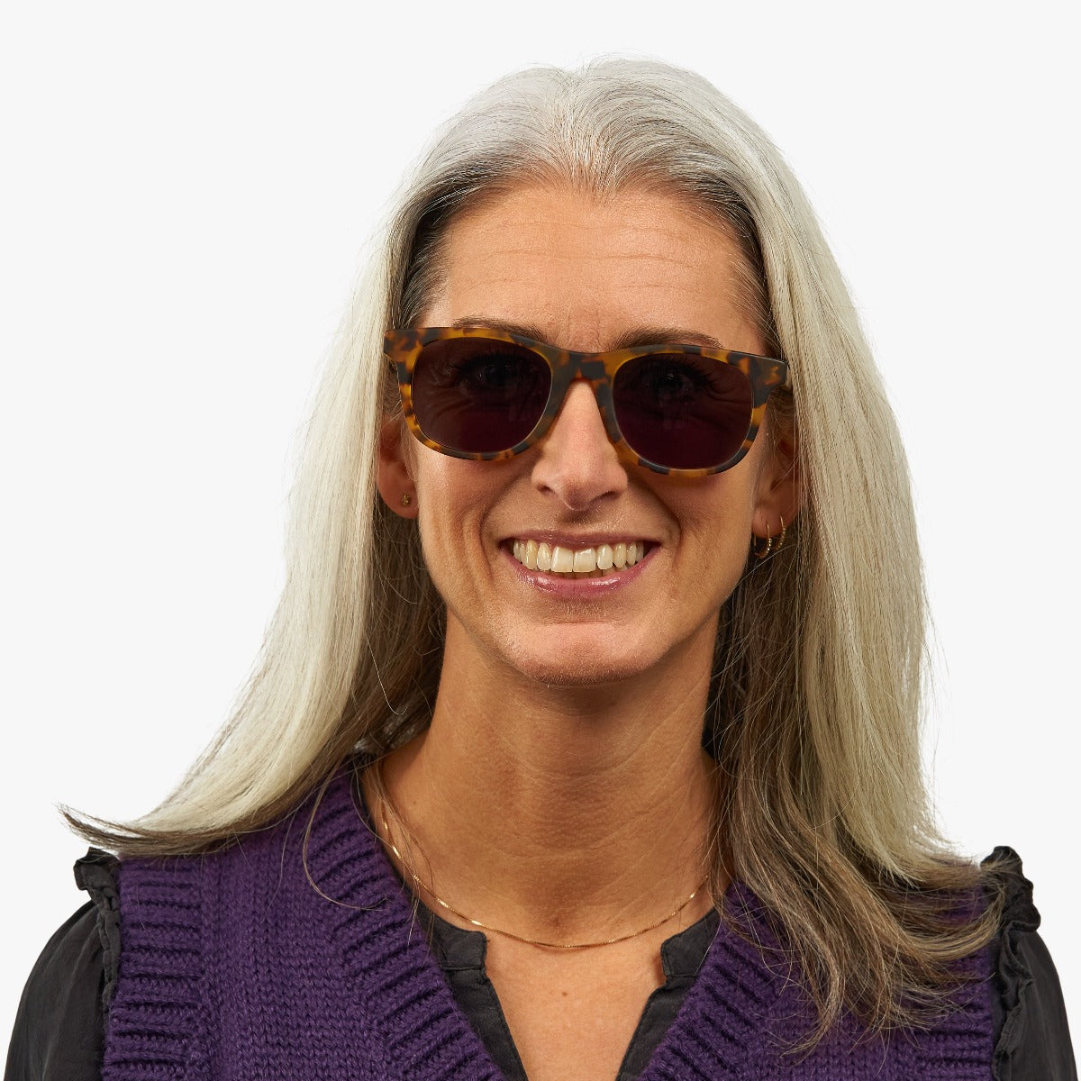 Person wearing Malmö Dark Turtle sunglasses with tortoiseshell frame